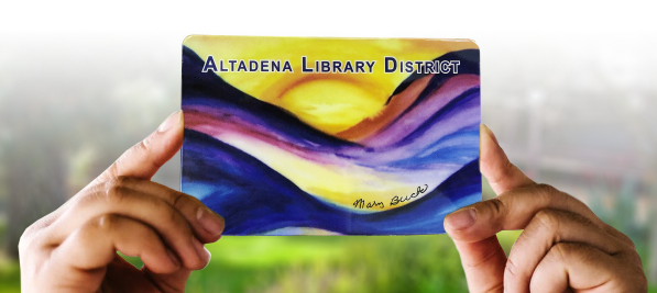 Hands holding up an Altadena Library card
